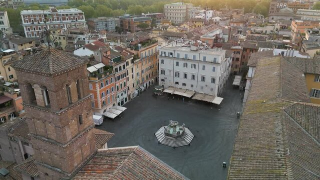 Drone Orbits Above Piazza di Santa Maria in Trastevere, Rome, Italy