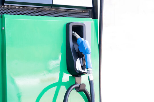 Close-up of the blue fuel filler handle. Fuel pump in a gas station fuel dispenser