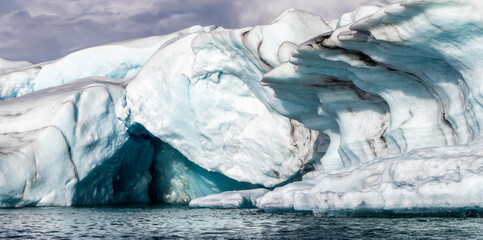 A large ice block with a hole in it