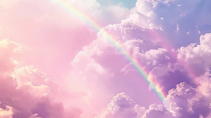 Dreamy pastel pink sky with clouds and rainbow © standret
