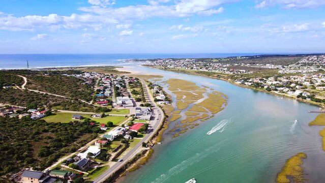 Motorboats and pleasure crafts on Goukou estuarine river in scenic Still Bay