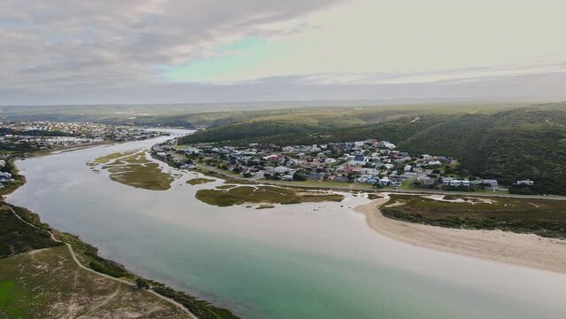 Aerial view over Goukou estuarine salt marsh of Still Bay east side at sunrise