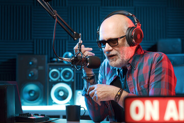 Radio host talking into the microphone