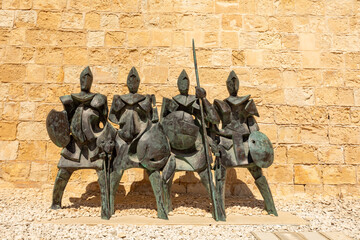 Statues of medieval knights outside Fort St Elmo, Iconic 16th-century bastion guarding the entrance...