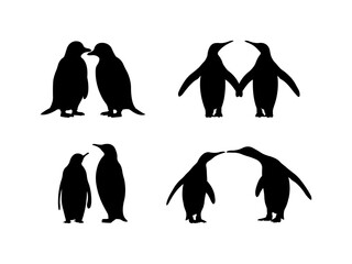 Naklejka premium Set of Penguin couple Silhouette in various poses isolated on white background