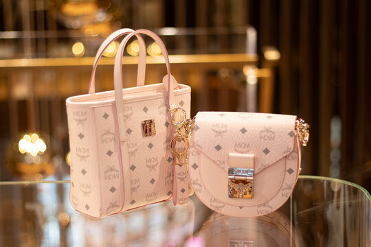 Closeup of Mcm Hand bag and a shoulder bag on display at store