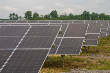 Rows array of photovoltaics solar cells in solar power station. Alternative clean renewable energy...