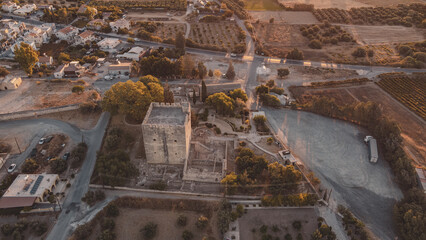 City on beach next to ocean with numerous boats in Kourion Amphitheater, Cyprus