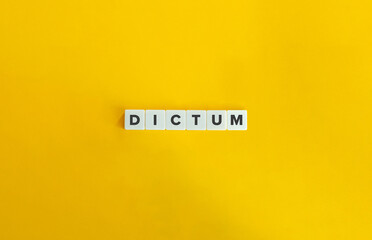 Dictum Word. Text on Block Letter Tiles on Flat Background. Minimalist Aesthetics.