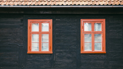 Fototapeta premium Old timber house with wooden windows
