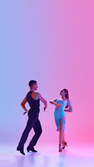 Poster. Young man and woman, ballroom dancers in stage costumes dancing tango energetically in neon...