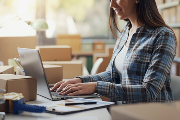 E-commerce specialist working with a laptop