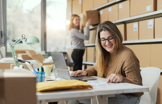 Professional e-commerce employees working together