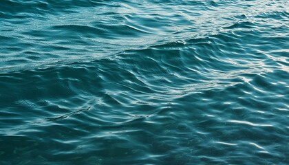 Fototapeta premium Turquoise Mirror: Highlights on Ocean Water Macro