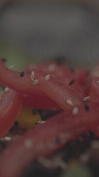 Closeup vertical footage of a plate of Chinese stir fry beef and vegetables