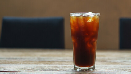 Ice americano coffee in a tall glass with ice cubes, Americano coffee or iced coffee without milk...