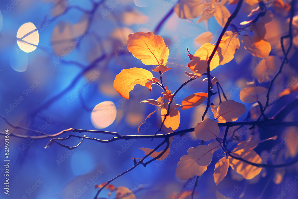Poster autumn leaves with bokeh lights in the background creating a dreamy effect