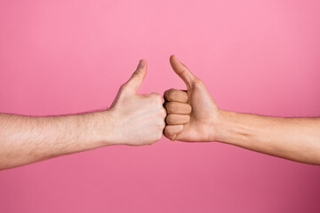 Photo of two people hands bumping like symbols isolated pastel color background