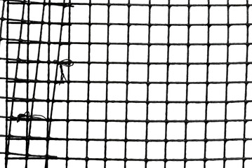 The texture of the metal mesh on a white background. Torn steel, metal mesh with holes