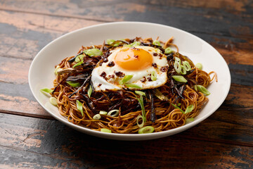 Scallion Oil Noodles with fried egg on top and chilli oil