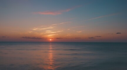 Obraz premium Sunset Over Calm Ocean Horizon