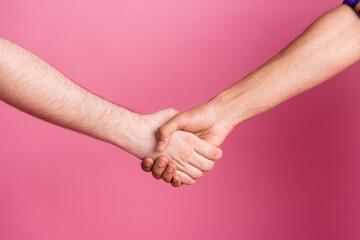Photo of two people friends giving helping hands isolated pastel color background