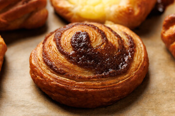 Mini danish pastry selection. Maple pecan plaits, cinnamon swirls and vanilla creme crowns