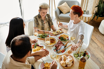 Diverse friends and a loving lesbian couple enjoying dinner together.