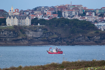 Obraz premium fishing boat in the bay
