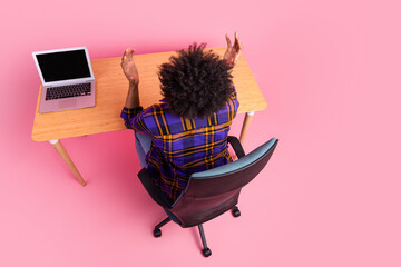 Photo of worker guy sit desk raise hands up feel desperate isolated pastel color background