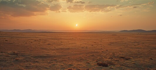 Fototapeta premium The wide-angle lens captures the horizon landscape in the desert, showcasing the magnificent scenery of the sky, white clouds, and golden sand