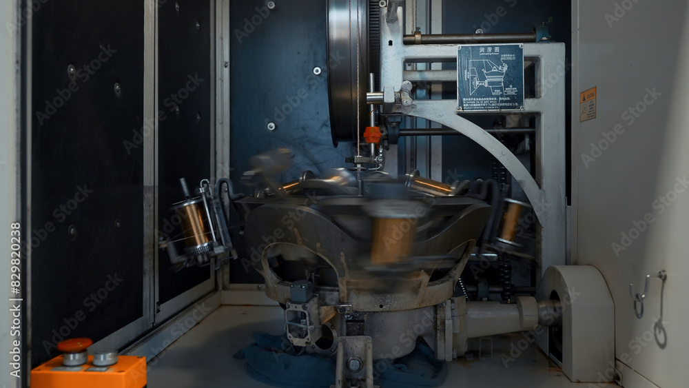 Aufkleber rotating machine with copper wire winding. creative. automated machine for winding copper wire on co