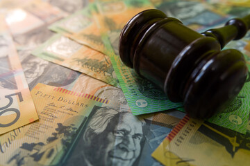 judge gavel and australian money aud Aussie currency