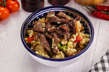 Traditional couscous with beef and vegetables