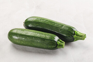 Raw green ripe zucchini vegetable
