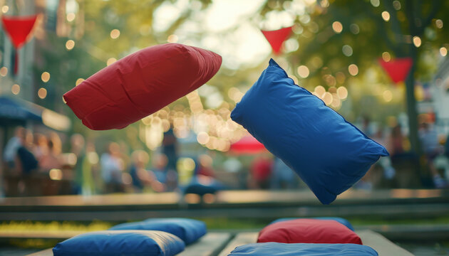 Closeup of red and blue bean bags in midair above cornhole boards during a competitive game, captured in high resolution with clear details and copy space