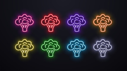 Neon bright broccoli icons in different colors on a dark background. The concept for veganism