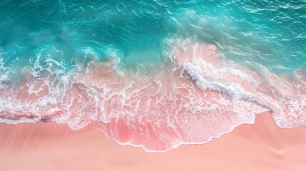 Highangle photograph of a picturesque pastel pink sand beach transitioning into the calm