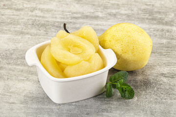 Canned yellow pear with syrup