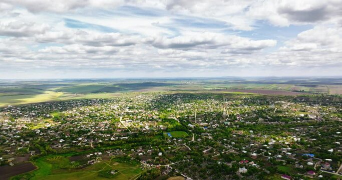 Aerial drone view of Pelinia, Drochia, Moldova with a cloudy sky