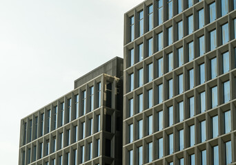 Fototapeta premium Neatly arranged exterior windows of modern buildings.
