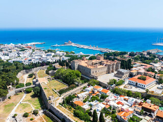 Palace of the Grand Master of the Knights of Rhodes with the Old Port Of Rhodes in The Background