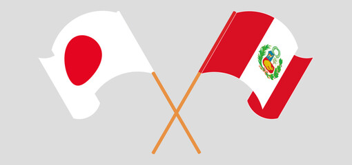 Crossed and waving flags of Japan and Peru