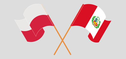 Crossed and waving flags of Poland and Peru