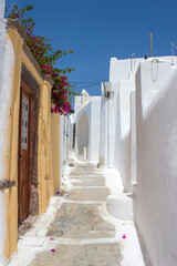 Narrow street in Emporeio - view of streets of medieval village Emporio at Santorini island