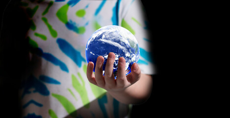 kid hold planet earth for saving environment world and earth concept