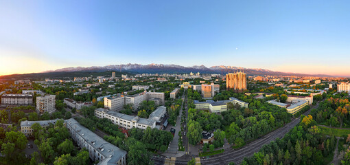 View from a quadcopter of the central part of the Kazakh city of Almaty on a spring morning against...