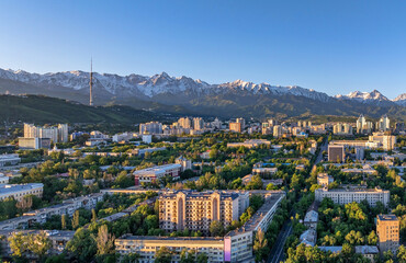 View from a quadcopter of the central part of the Kazakh city of Almaty on a spring morning against...