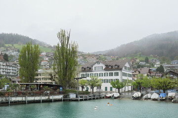 Fototapeta premium Thun, Switzerland - 9 April 2024. Switzerland Boat trip on Lake Thun in Switzerland. Incredible landscapes and views from the boat