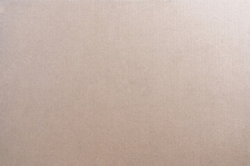 An aged cardboard texture background with a vintage paper pattern
